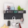 Shelf with a storage basket and five hooks - Black
